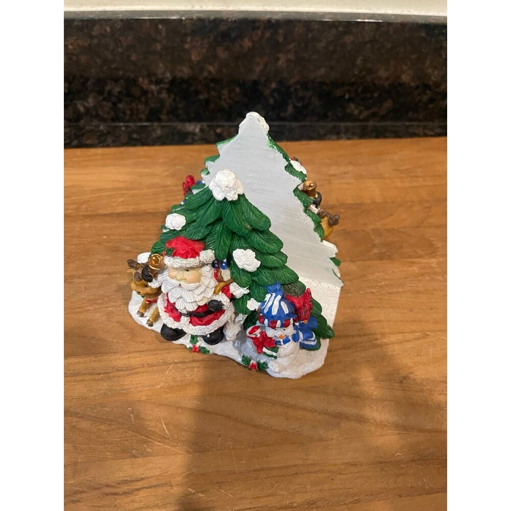 Santa Claus with frosty napkin holder